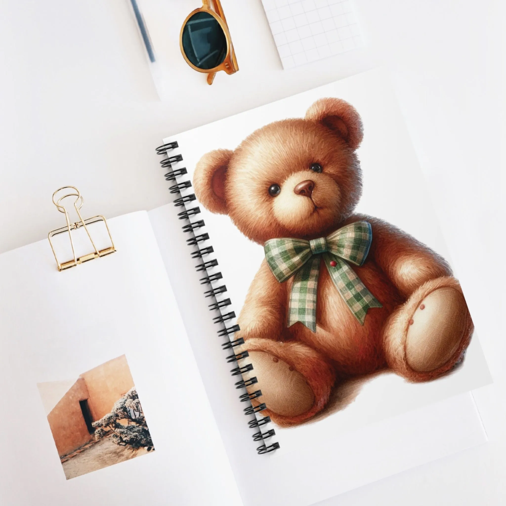 A cute teddy bear with a green ribbon  Spiral Notebook - Ruled Line